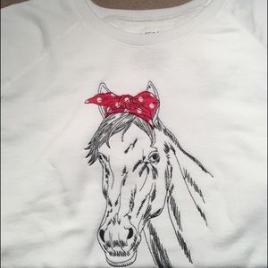 Embroidered horse sweatshirt.
